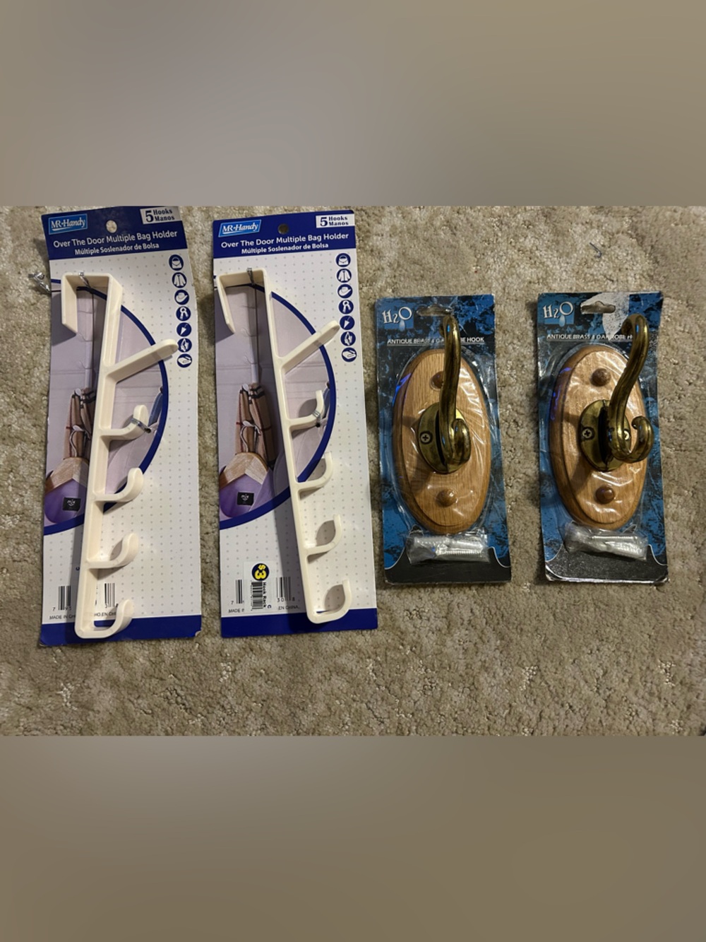 NWT 4 hooks.  2 oak antique brass  w/ hardware & 2 plastic over the door hooks.